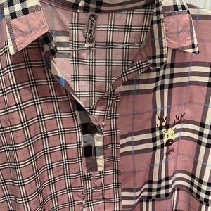 It’s is a cute Burberry colored theme dress shirt